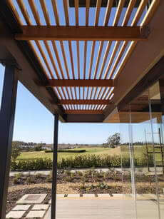 Timber pergolas, decks & handrails by Custom Decks & Walkways